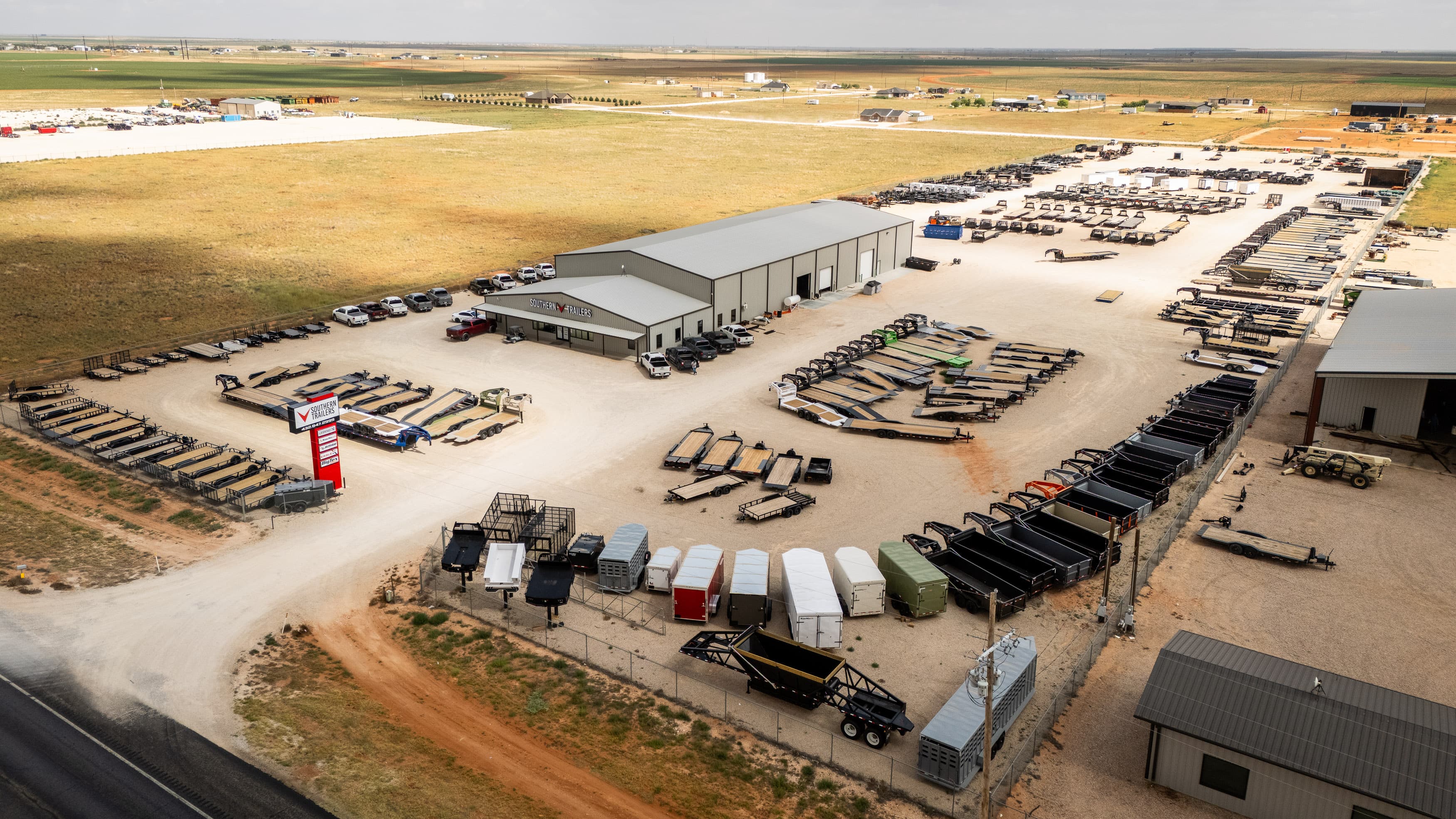Aerial view of the Southern Trailers Seminole dealership, with its showroom and rows of trailers.